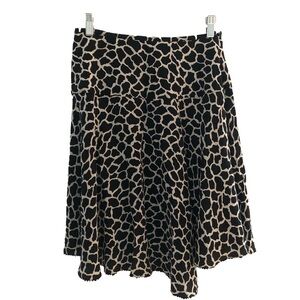 100% Silk Animal print midi flare skirt with wrap like slit, size 4